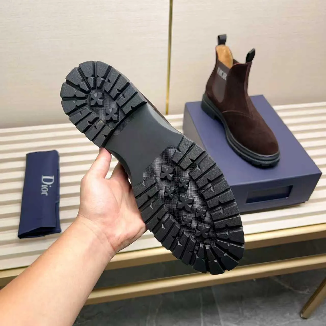Men's Shoes 💰480 Dior A practical choice that combines protection with classic style. Made from durable Rugged Calf leather, it's tumbled and hand-finished to create a soft suede feel with a rich texture. Elastic side panels and subtle cutouts are inspired by the classic Chelsea boot. Leather upper and lining with Kummel tabs at front and rear, rubber outsole